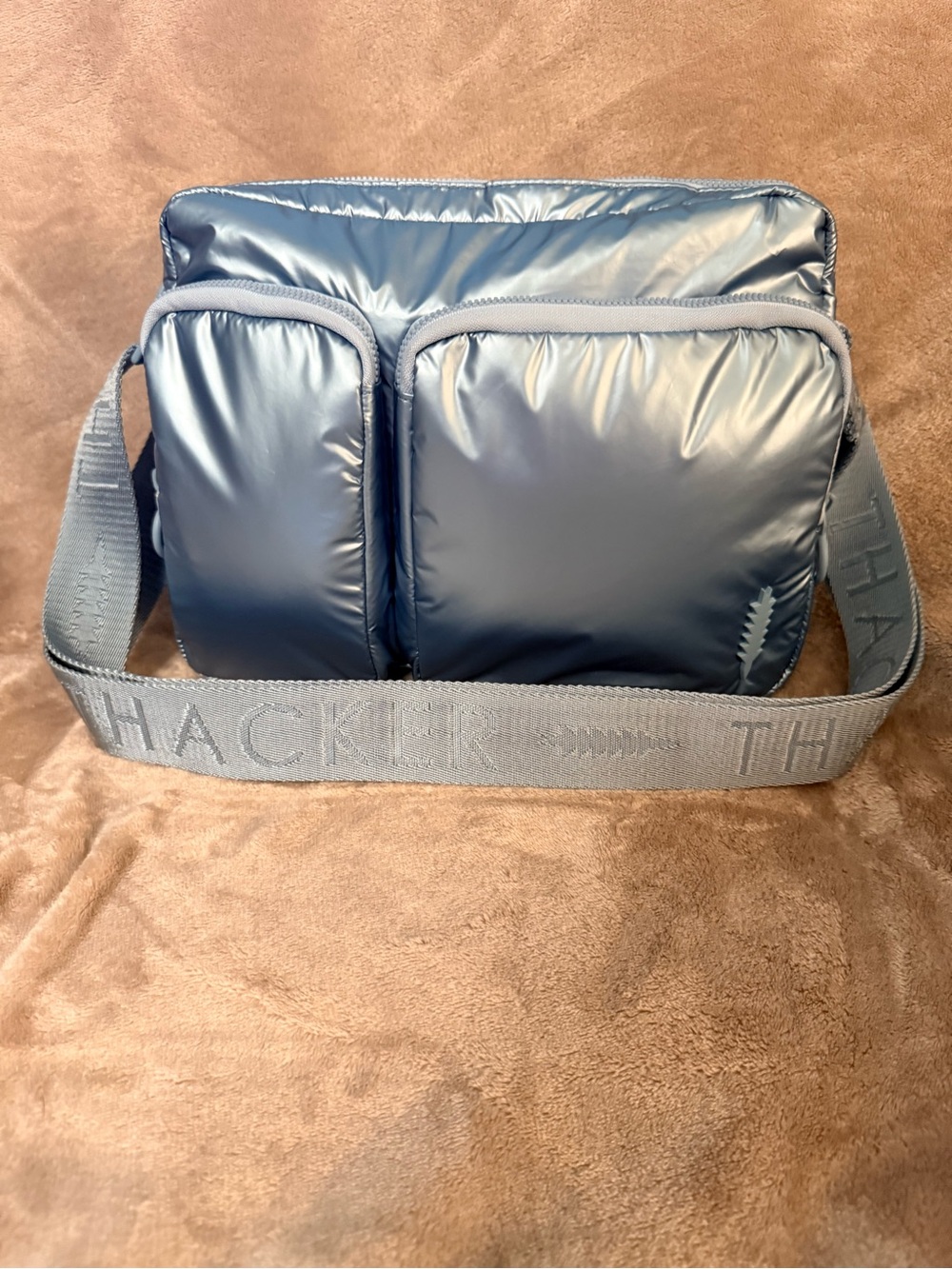Thacker Padded Crossbody Bag in Metallic Ice Blue